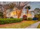Beautiful two-story home with white siding, a welcoming front porch, and mature landscaping in a nice neighborhood at 724 Hibbens Grant Blvd, Mount Pleasant, SC 29464
