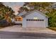 Charming home exterior with a screened-in porch and garage at 724 Hibbens Grant Blvd, Mount Pleasant, SC 29464