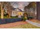 Charming home with manicured landscaping, dark picket fence, and inviting curb appeal at 724 Hibbens Grant Blvd, Mount Pleasant, SC 29464