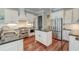 Modern kitchen featuring stainless steel appliances, granite countertops, and custom cabinetry, perfect for cooking at 724 Hibbens Grant Blvd, Mount Pleasant, SC 29464