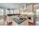 Kitchen featuring stainless appliances, kitchen island with sink, and seamless access to dining room at 724 Hibbens Grant Blvd, Mount Pleasant, SC 29464