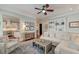 This is a beautiful living room open to kitchen and featuring built-in cabinets and comfortable seating at 724 Hibbens Grant Blvd, Mount Pleasant, SC 29464