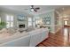 Cozy living room with a fireplace, comfortable seating, and hardwood floors at 724 Hibbens Grant Blvd, Mount Pleasant, SC 29464