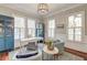 Bright office space with ample natural light, hardwood floors, and custom built-ins, ideal for remote work at 724 Hibbens Grant Blvd, Mount Pleasant, SC 29464