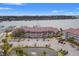 Aerial perspective of 76 Mariners Cay with surrounding waterways, docks, and parking areas at 76 Mariners Cay Dr, Folly Beach, SC 29439