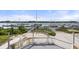 A view from the rear balcony to the marina shows docks and open water access at 76 Mariners Cay Dr, Folly Beach, SC 29439