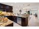 Modern kitchen featuring stainless steel appliances, granite countertops, and easy flow to the dining area at 76 Mariners Cay Dr, Folly Beach, SC 29439