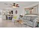 Spacious living area with modern furnishings and an open view of the dining room at 76 Mariners Cay Dr, Folly Beach, SC 29439