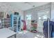 Spacious walk-in closet with custom storage solutions, dual windows, and ample space at 824 Forrest Dr, Charleston, SC 29492
