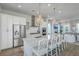 Modern kitchen featuring stainless steel appliances, a large island with seating, and pendant lighting at 824 Forrest Dr, Charleston, SC 29492