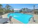 Community pool with clear, refreshing water and ample seating for residents to relax and unwind at 824 Forrest Dr, Charleston, SC 29492