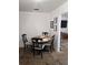 Charming dining room featuring a round table, four chairs, and stylish décor at 824 Orangeburg Rd, Summerville, SC 29483