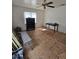 Open living room features a ceiling fan and natural light from a window at 824 Orangeburg Rd, Summerville, SC 29483