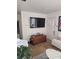 Cozy living room featuring a plush white chair and natural light at 824 Orangeburg Rd, Summerville, SC 29483