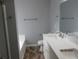 Bathroom featuring double sinks, large mirror, tiled floors, and a toilet at 8309 Berringer Bluff, North Charleston, SC 29418