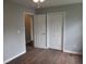 Neutral bedroom with hardwood flooring, two closets and plenty of natural light at 8309 Berringer Bluff, North Charleston, SC 29418