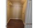 Walk-in closet with wood-look flooring and shelving at 8309 Berringer Bluff, North Charleston, SC 29418