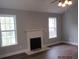Spacious living room with wood floors, ceiling fan and a fireplace at 8309 Berringer Bluff, North Charleston, SC 29418