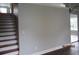 Carpeted staircase with neutral colored walls and wood-look flooring at 8309 Berringer Bluff, North Charleston, SC 29418