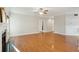 Bright living room featuring hardwood floors and access to other rooms at 8716 Dover Creek St, North Charleston, SC 29420