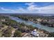 Wide angle aerial view of waterfront community with docks, lush landscaping, and bay access out to the ocean at 886 Piccadilly Cir, Charleston, SC 29412