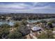 Scenic aerial view of a waterfront neighborhood featuring private docks and lush greenery, backing onto a tranquil bay at 886 Piccadilly Cir, Charleston, SC 29412