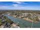 A serene aerial view of a coastal neighborhood with private docks and lush greenery along the waterfront at 886 Piccadilly Cir, Charleston, SC 29412