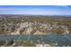 Expansive aerial shot of a residential area featuring waterfront properties with private docks and mature trees at 886 Piccadilly Cir, Charleston, SC 29412