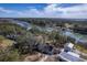 Waterfront home nestled among trees, complete with a private dock, and picturesque marsh and bay views at 886 Piccadilly Cir, Charleston, SC 29412