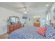 Spacious main bedroom with matching dressers, stylish decor, bathroom, and bright windows at 886 Piccadilly Cir, Charleston, SC 29412