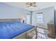 This bedroom has a bed and door leading to the backyard at 9988 Winged Elm St, Ladson, SC 29456