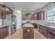 Well-equipped kitchen with stainless steel appliances, granite countertops, and ample cabinet space at 9988 Winged Elm St, Ladson, SC 29456
