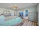 The primary bedroom features plenty of storage space with dressers and an en-suite bathroom at 9988 Winged Elm St, Ladson, SC 29456