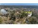 An aerial view of a neighborhood featuring a lake, homes, community buildings and green spaces at 100 Lakeview Dr, Summerville, SC 29485