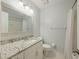 Bathroom featuring granite countertops, patterned tile flooring, and shower at 100 Lakeview Dr, Summerville, SC 29485
