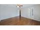 An open, neutral-toned bedroom with wood flooring and ample doorway access at 100 Lakeview Dr, Summerville, SC 29485