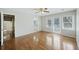 Bedroom featuring hardwood floors, ceiling fan, and a door leading to a balcony at 100 Lakeview Dr, Summerville, SC 29485