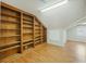 Bonus room with hardwood floors and expansive custom built-in shelves at 100 Lakeview Dr, Summerville, SC 29485