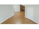 Open bonus room features hardwood floors and neutral walls at 100 Lakeview Dr, Summerville, SC 29485