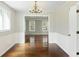 Charming dining area with hardwood floors offers easy access to living room and a delightful view at 100 Lakeview Dr, Summerville, SC 29485
