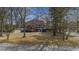 Charming two-story brick home with a cozy front porch and a well-maintained front yard at 100 Lakeview Dr, Summerville, SC 29485
