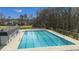 Large community swimming pool with lounge chairs, perfect for summer relaxation and recreation at 100 Lakeview Dr, Summerville, SC 29485