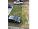 Backyard with grass, parking and cars at 101 Queen St, Charleston, SC 29401