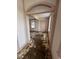 This is a bedroom featuring light pink walls, a door, and a window providing natural light at 101 Queen St, Charleston, SC 29401