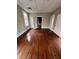 Room with hardwood floors, natural light and two doors at 101 Queen St, Charleston, SC 29401