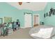 Inviting bedroom featuring a neutral color scheme, desk, and plenty of space at 1025 Riverland Woods Pl # 116, Charleston, SC 29412