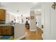 Entryway view of open-concept living area featuring hardwood floors and natural light at 1025 Riverland Woods Pl # 116, Charleston, SC 29412