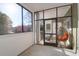 Relaxing screened-in porch with stylish seating and views of the community at 1025 Riverland Woods Pl # 116, Charleston, SC 29412