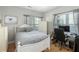 Cozy bedroom featuring a work desk and hardwood floors at 1025 Riverland Woods Pl # 907, Charleston, SC 29412