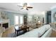 Spacious living room with a fireplace, ceiling fan, and hardwood floors at 1025 Riverland Woods Pl # 907, Charleston, SC 29412